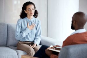 Woman learning about cognitive behavioral therapy vs psychotherapy
