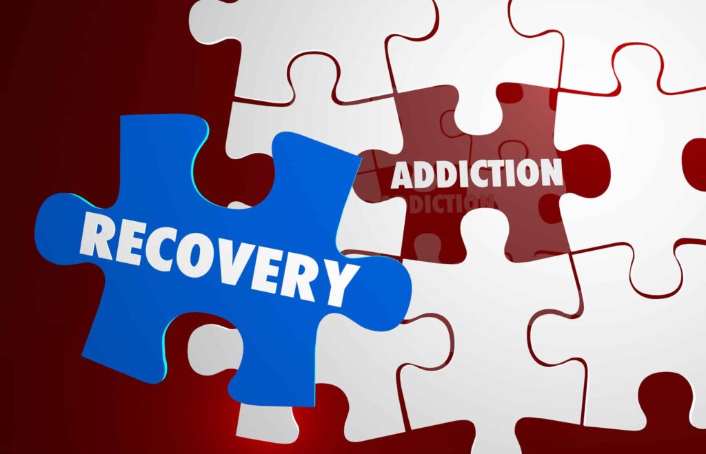 an artful puzzle image with the words "addiction" and "recovery"