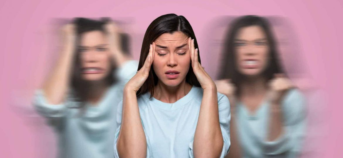 artful interpretation of different emotions anger frustration as someone holds their temples