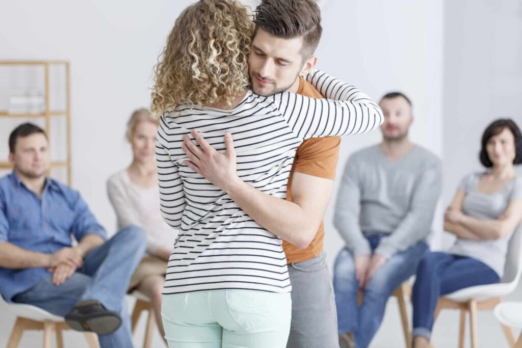 two people in therapy hug