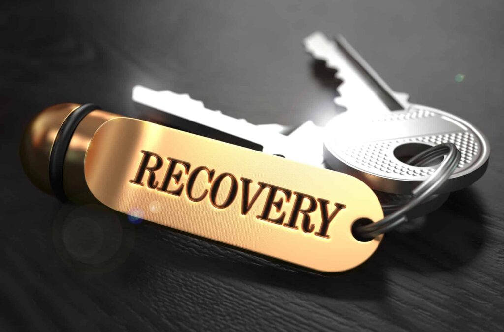 keychain on keys reading "recovery"