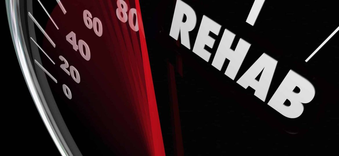 a speedometer that is approaching "rehab"