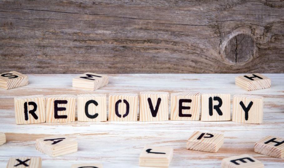 wooden blocks that spell "recovery"