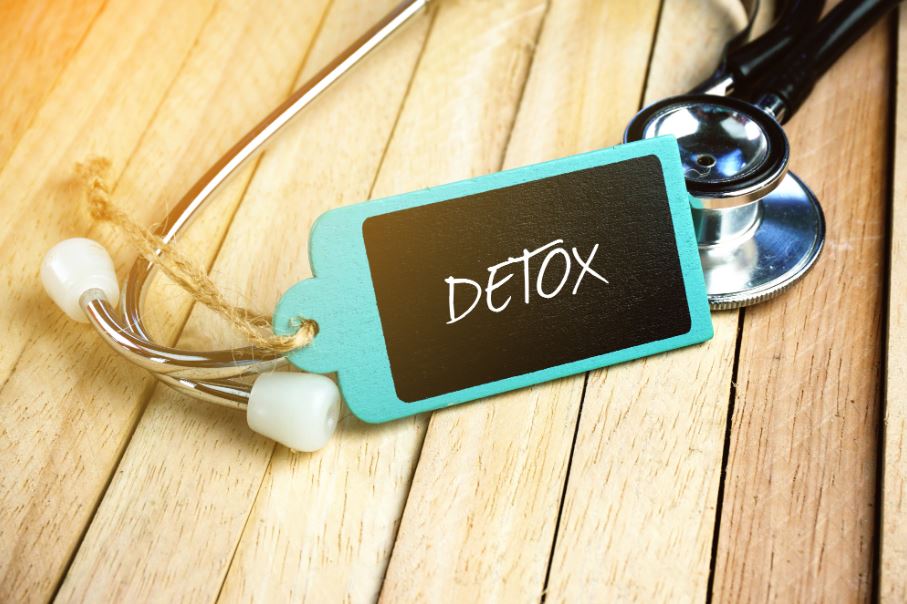 a tag on a stethoscope reading "detox"