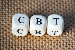 dice spelling "CBT"