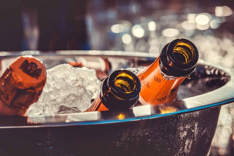 champagne bottles on ice