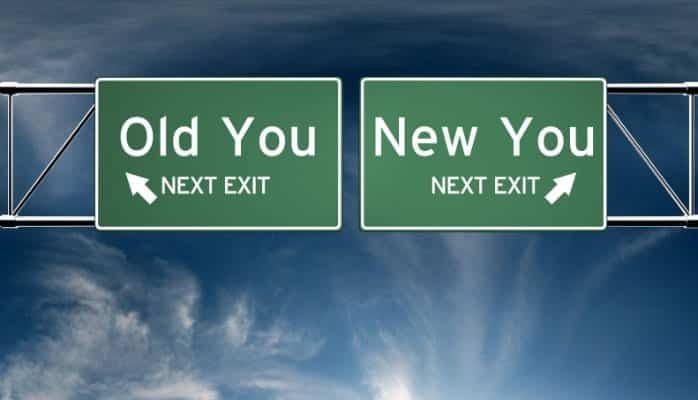 road signs reading "old you next exit" and 'new yo next exit" with opposing arrows