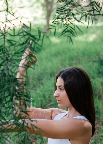 a person meditates outside