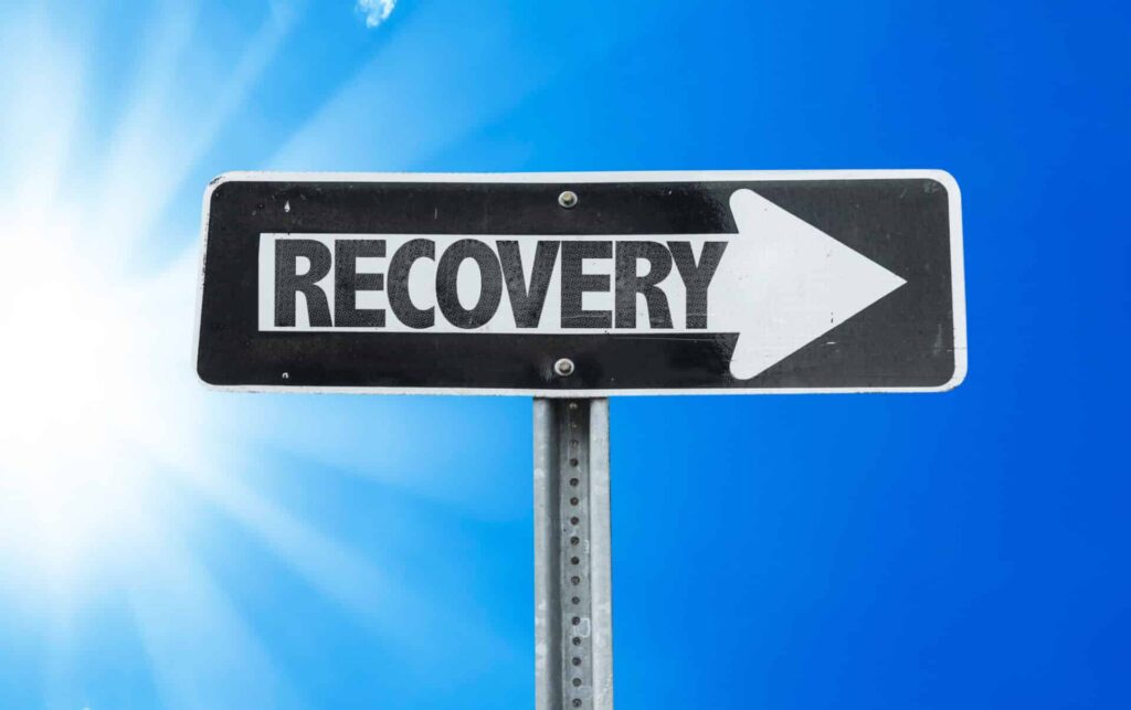 a sign reading "recovery"