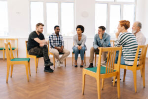 A group of people in outpatient drug counseling