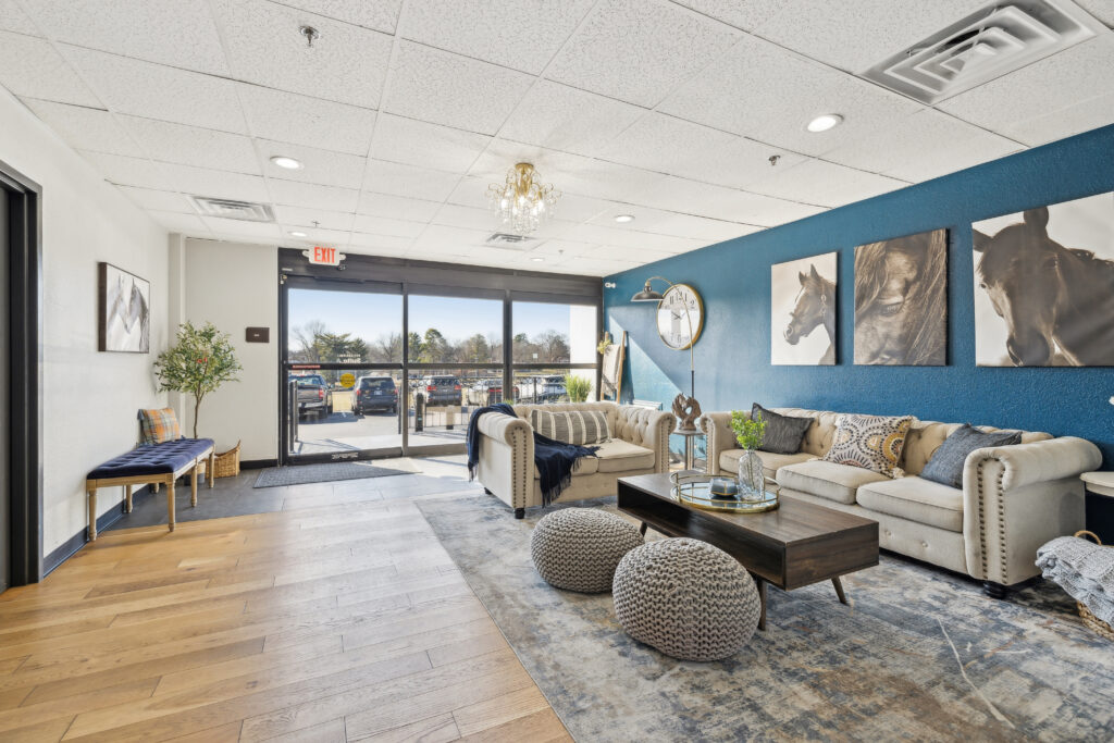 Photograph taken of the inside waiting area at reception in Apex Recovery